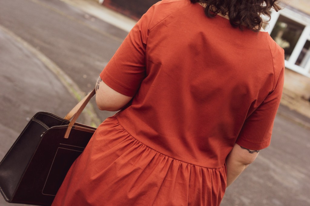 Detail shot of the back of The Gathered Dress, showing the zip has been removed. 